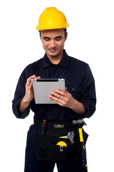 Field worker accessing touch pad — Stock Photo, Image