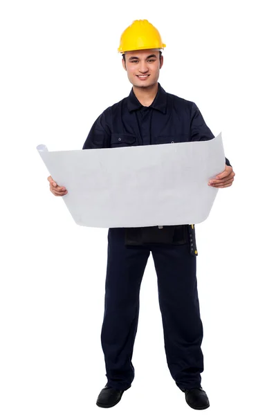 Male architect with construction plan — Stock Photo, Image