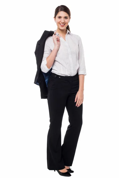 Corporate lady with blazer slung over her shoulder — Stock Photo, Image