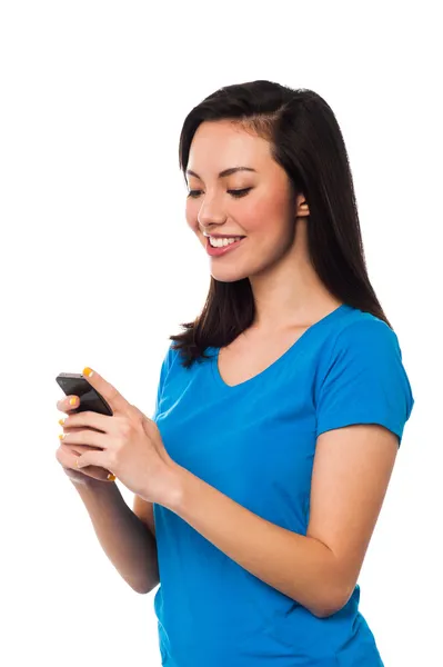 Pretty girl sending text message to her boyfriend — Stock Photo, Image