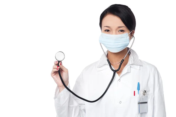 Female physician posing with stethoscope — Stock Photo, Image