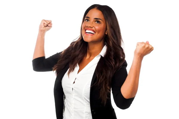 Excited businesswoman with clenched fists — Stock Photo, Image