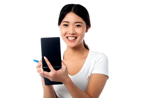 Pretty female assistant taking down notes — Stock Photo, Image