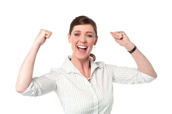 Excited corporate lady with clenched fists — Stok fotoğraf