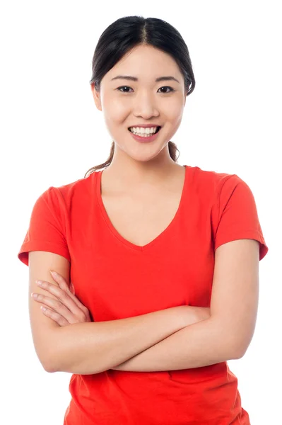 Casual young girl posing, arms crossed — Stock Photo, Image