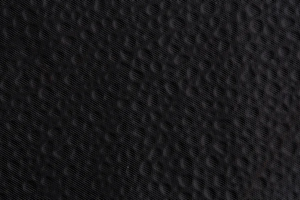 Black dotted fabric texture — Stock Photo, Image