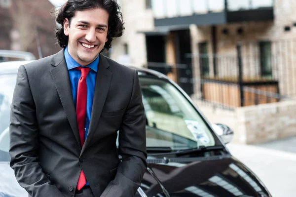 Handsome corporate man posing casually — Stock Photo, Image