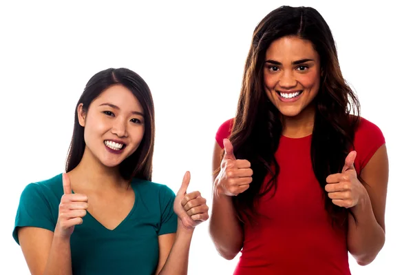 Two girls cheering up with thumbs up — Stock Photo, Image