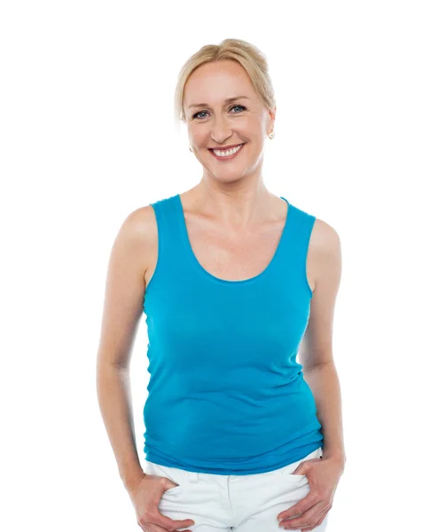 Pretty woman in bright blue sleeveless top — Stok fotoğraf