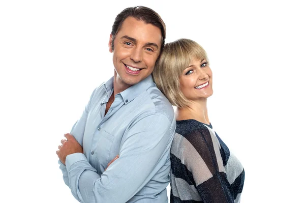 Cheerful couple leaning on each other — Stock Photo, Image