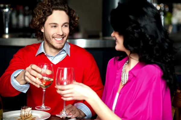 Cheers! Couple celebrating their love together — Stock Photo, Image