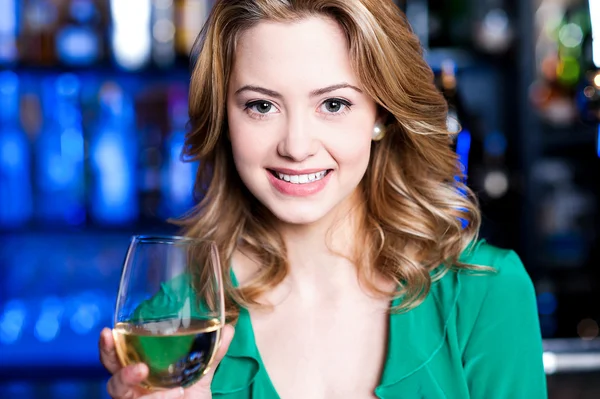 Attractive young girl drinking wine — Stock Photo, Image