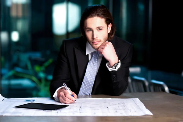 Smart businessman projecting his plans — Stock Photo, Image
