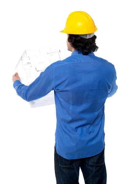 Construction worker with blueprint plan — Stock Photo, Image