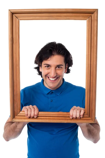 Framed interest, smiling young male — Stock Photo, Image
