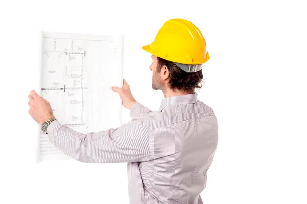 Architect reviewing building plan — Stock Photo, Image