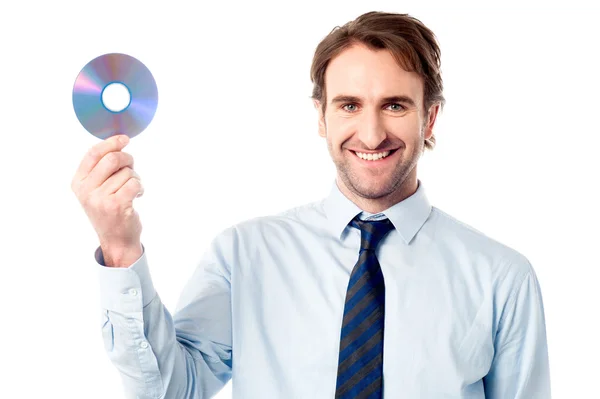 Manager showing compact disc — Stock Photo, Image