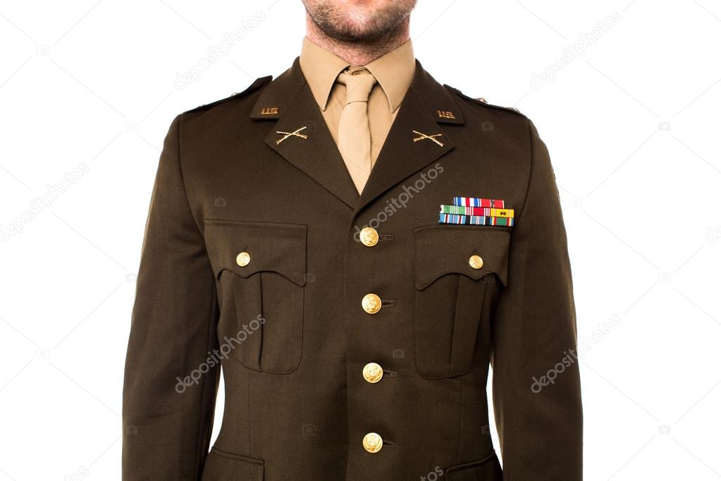 Young man in military uniform, cropped image