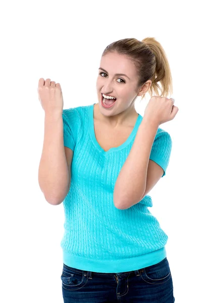 Excited charming girl with clenched fists — Stock Photo, Image
