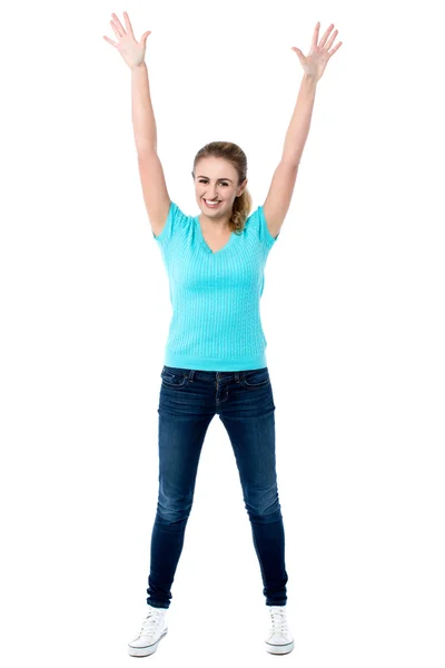 Joyous female raising arms in excitement — Stock Photo, Image