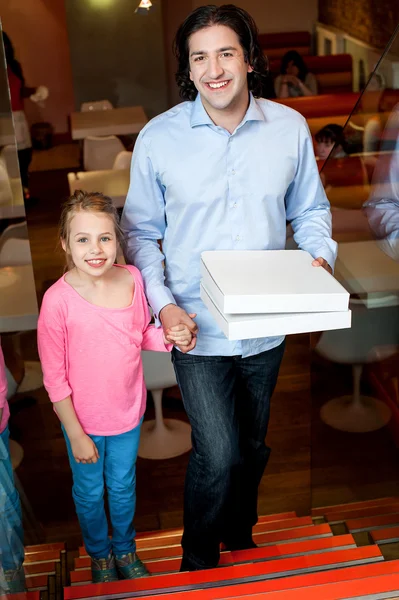 Father and daughter posing on stairs — Stock Photo, Image