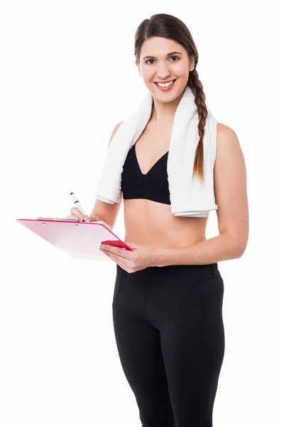 Passen dame trainer voorbereiden dieet grafiek — Stockfoto