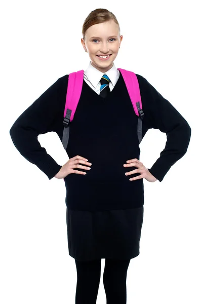 Smiling schoolgirl posing with confidence — Stock Photo, Image