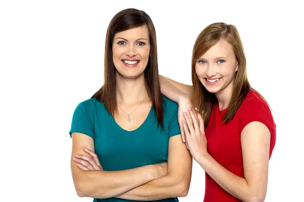 Pretty teenager girl with her mother — Stock Photo, Image