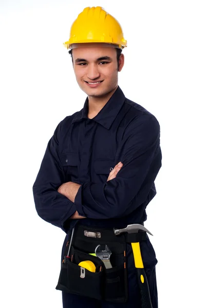 Young worker wearing yellow hard hat — Stock Photo, Image