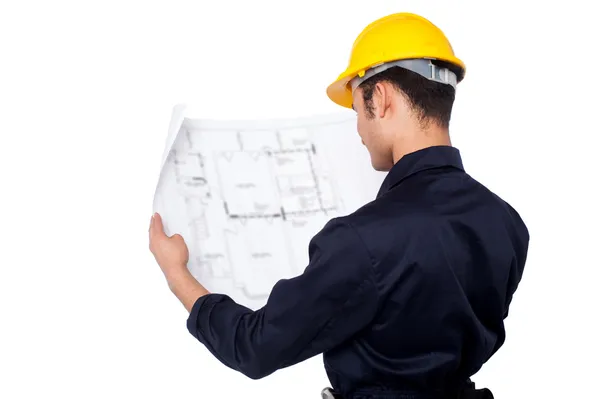 Civil engineer reviewing blueprint — Stock Photo, Image