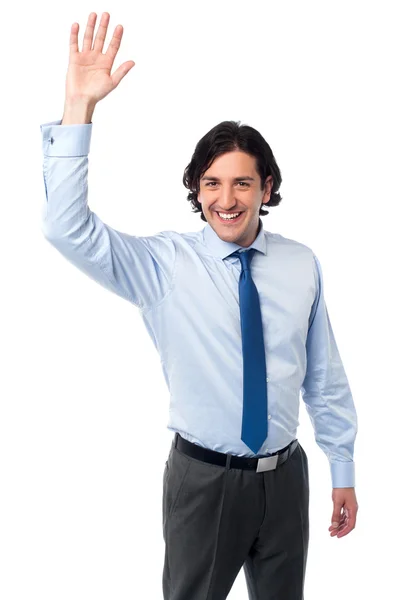 Businessman waving hi to his colleague — Stock Photo, Image