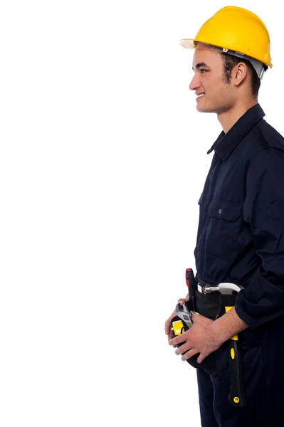 Smiling handyman isolated over white — Stock Photo, Image