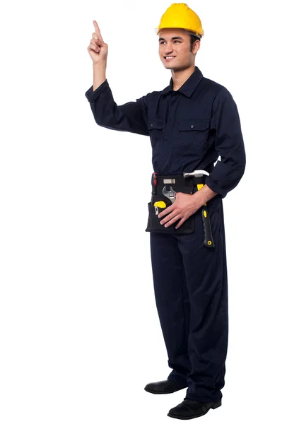 Construction worker pointing upwards — Stock Photo, Image