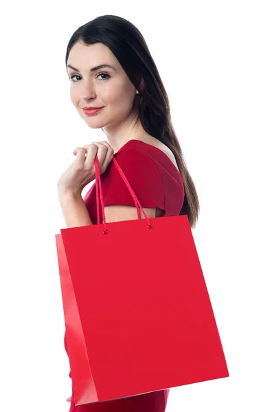 Mooie vrouw met een boodschappentas — Stockfoto