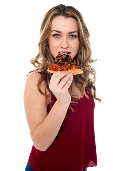 Young woman enjoying yummy pizza slice — Stock Photo, Image