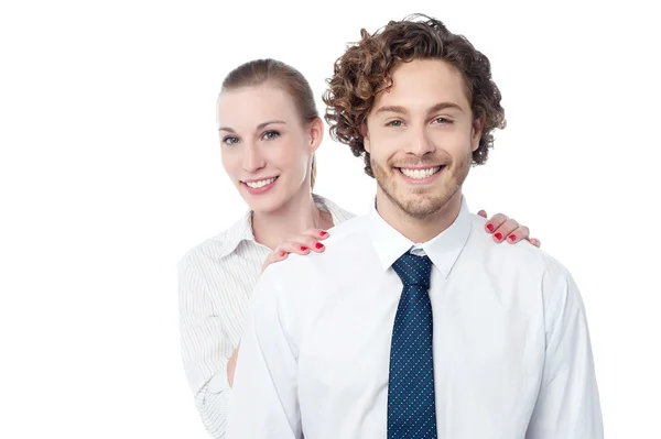 Businesswoman hiding behind her coworker — Stock Photo, Image