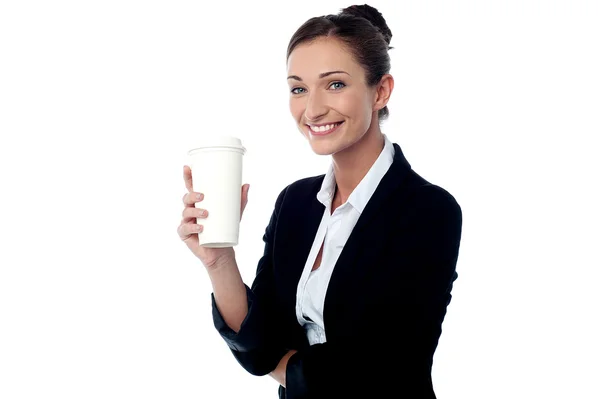 Cheerful business lady holding beverage — Stock Photo, Image