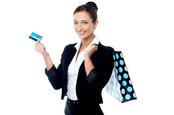 Businesswoman with shopping bag and cash card — Stock Photo, Image