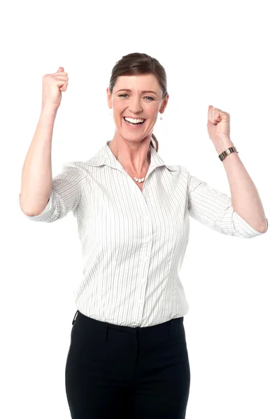 Excited corporate lady with clenched fists — Stok fotoğraf