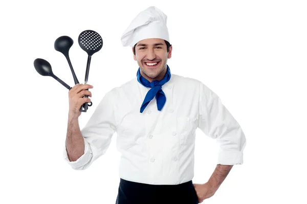 Chef showing kitchen essentials — Stock Photo, Image