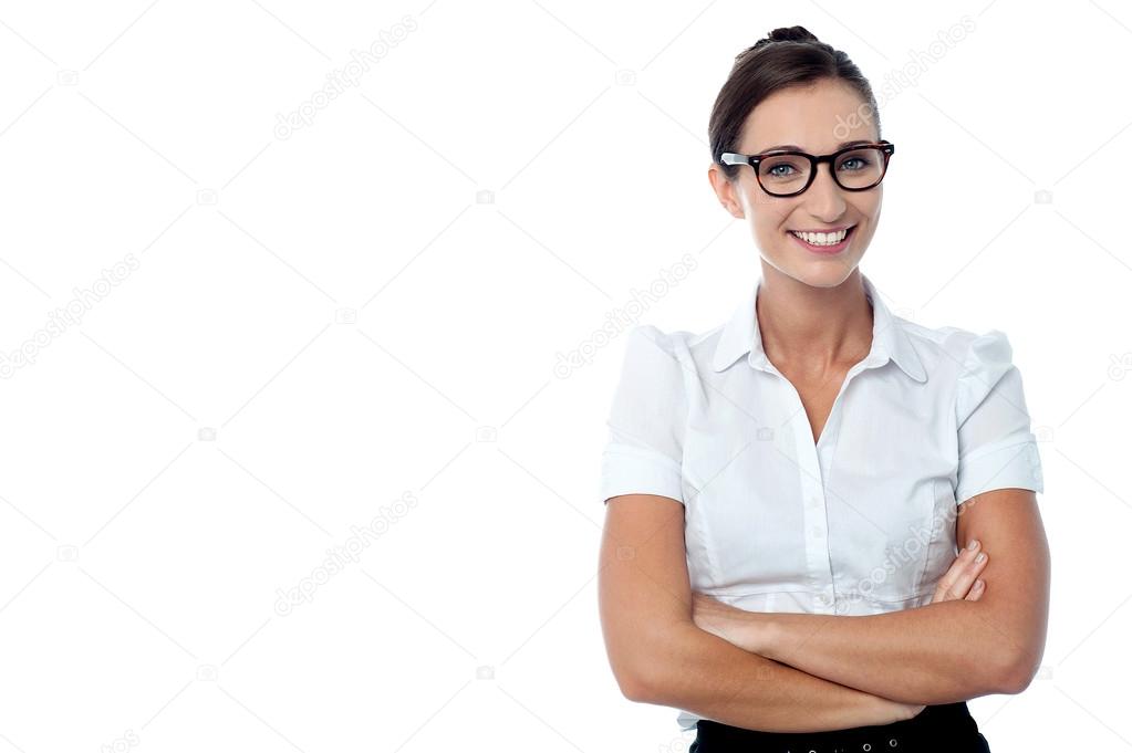 Confident bespectacled corporate woman