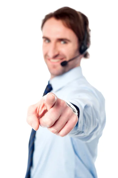 Customer support execuitive pointing you out Stock Image