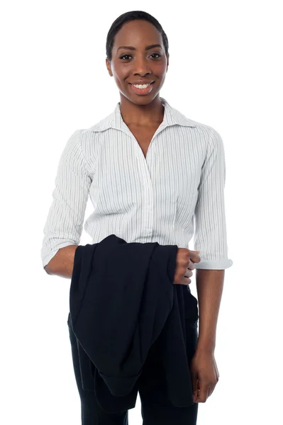 Elegant businesswoman holding coat — Stock Photo, Image