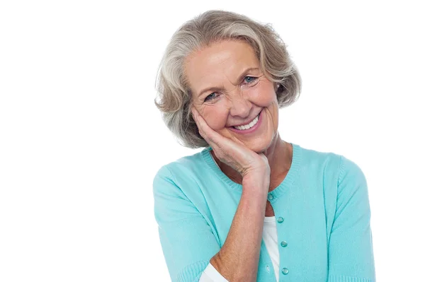 Shy and polite senior smiling woman — Stock Photo, Image