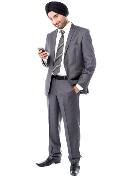 Male executive sending text message — Stock Photo, Image