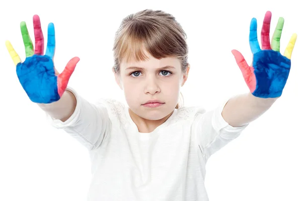 Cute girl with painted hands — Stock Photo, Image