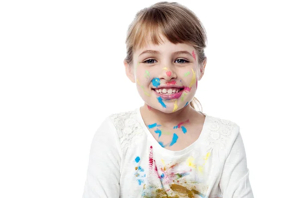 Smiling cute kid with painted face — Zdjęcie stockowe