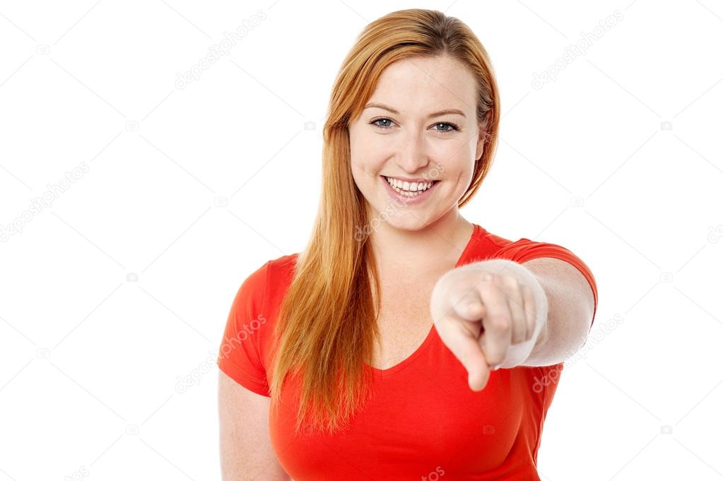 Young woman pointing you out