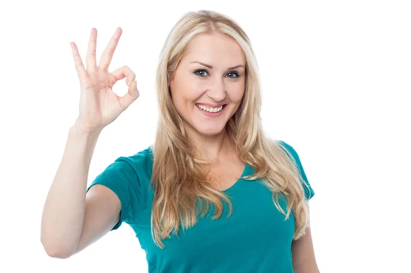 Smiling woman gesturing perfect sign Royalty Free Stock Images