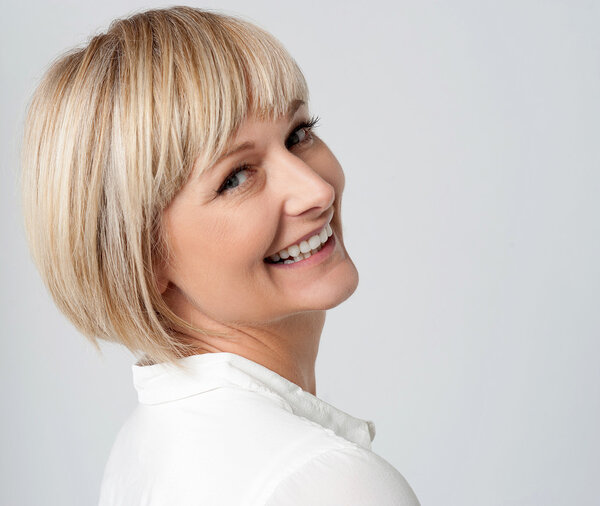 Woman looking over her shoulders